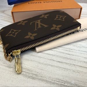Bnib Louis Vuitton key pouch monogram